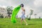 A woman tries to inflate an air sofa