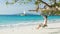 Woman on tropical sea shore. Similan Islands, Thailand