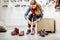 Woman trying shoes for hiking in the shop