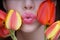 Woman with tulips kiss. Sensual lips. Kissing. 8 march women`s day.