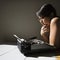 Woman with typewriter.