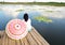 Woman umbrella on a bamboo raft