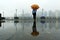 Woman with umbrella watching Shanghai, China