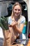 woman unloading groceries in supermarket carpark