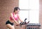 Woman use exercise bike