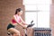 Woman use exercise bike