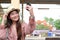 Woman use smart phone to take selfie photo at train station. traveler travel on holiday