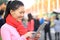 Woman use tablet in street