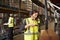 Woman using a barcode reader in a distribution warehouse