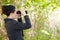 Woman using binoculars