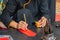 Woman using brush drawing calligraphy on lucky money red envelop