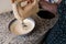 Woman using electric mixer for preparing cheesecake ingredients