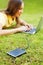 Woman using hard drive disk to backup her data