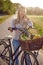 Woman using her bicycle to buy fresh produce