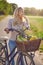 Woman using her bicycle to buy fresh produce