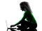 Woman using laptop Computers silhouette isolated