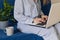 Woman using laptop personal computer on sofa. Work from home