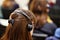 Woman using translation headphones during event