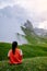 Woman on vacation hiking in the Italien Dolomites, Amazing view on Seceda peak. Trentino Alto Adige, Dolomites Alps