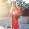 Woman with vaccination passport and mask ready to travel