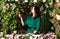 Woman on the veranda with flowers