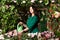 Woman on the veranda with flowers