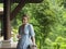 Woman In Veranda With Glass Of Water