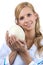 Woman veterinarian hold ostrich egg