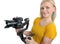 Woman videographer using steady cam,