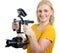 Woman videographer using steady cam, on white