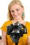 Woman videographer using steady cam, on white