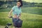 Woman with vintage bike outdoor, summer Tuscany