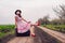 Woman in vintage clothes with suitcase