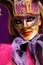 woman in violet party mask