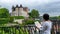 Woman visiting castle of Pau city in France
