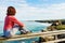 Woman visiting Cathedral Beach in Spain