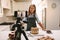 Woman vlogger recording video for food channel