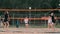 Woman volleyball serve. Woman getting ready to to serve the volleyball while standing on the beach slow motion.