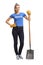 Woman volunteer standing with a shovel