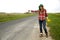 Woman vote on road with finger up