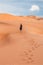 Woman in Wahiba Sands desert in Oman