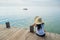 Woman waiting for boat at the dock