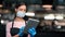 Woman waitress in medical mask with digital tablet order menu. Shot on RED Raven 4k Cinema Camera