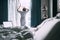 Woman wakes up in luxus hotel room