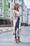 Woman walk on the street city style fashion casual elegant high