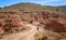 Woman walking Across Muela de Teruel Mountain