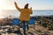 Woman walking alone on the seaside on cold winter day. Travel Lifestyle concept