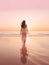 Woman Walking Along the Beach in Serenity