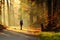 Woman walking in autumn forest