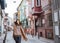 woman walking in balat turkey full of colorful house